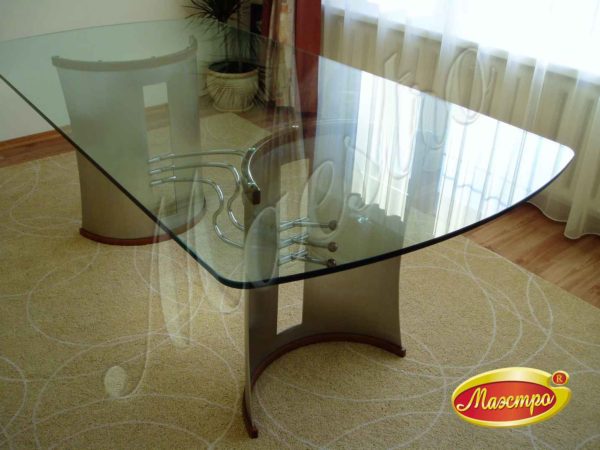 Фотография дизайнерский стол из нержавеющей стали и стекла